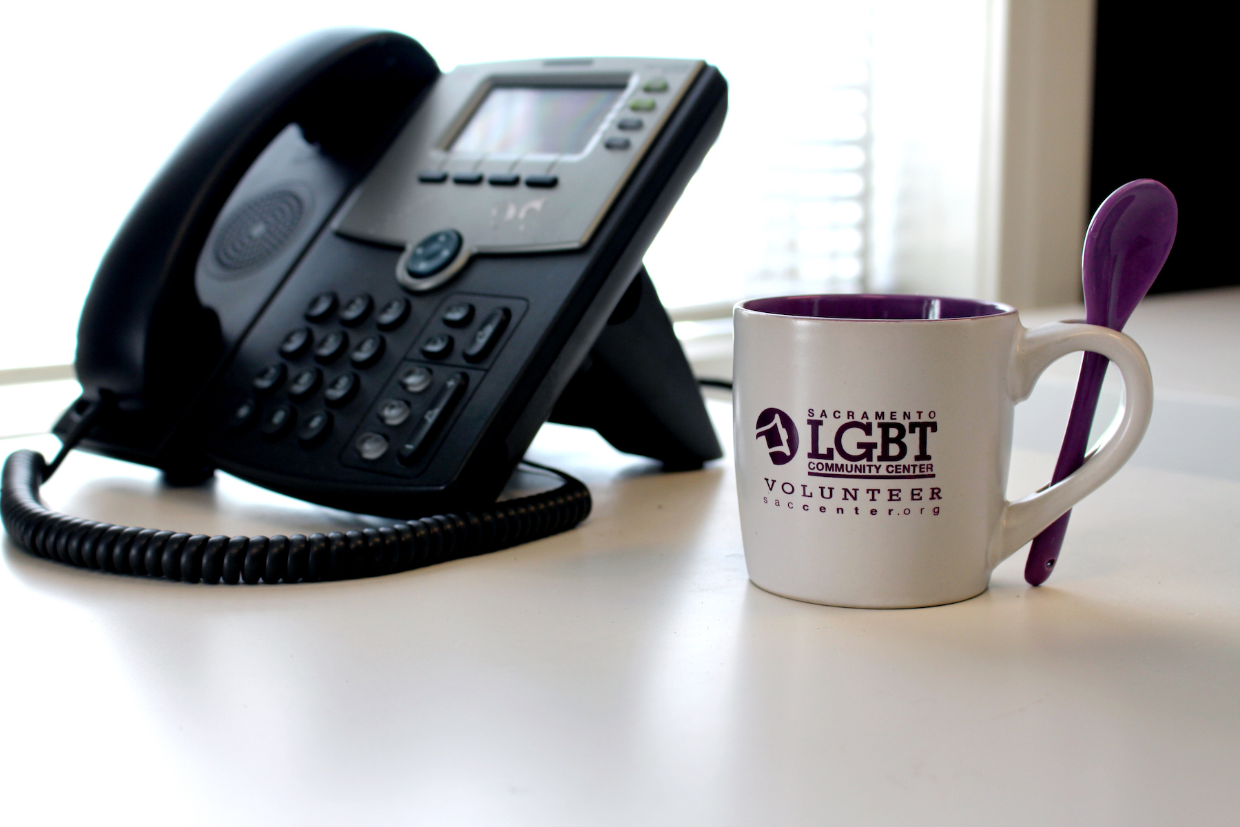 Picture of a telephone and volunteer tea cup